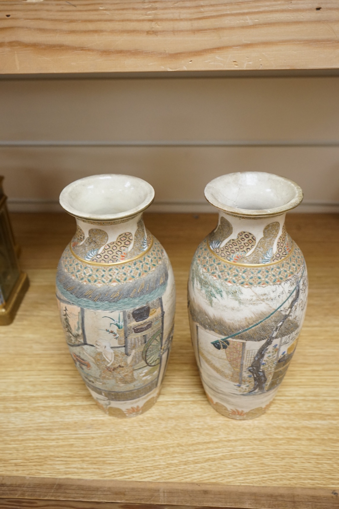 A pair of Japanese Satsuma vases,Meiji period, signed, 23cm